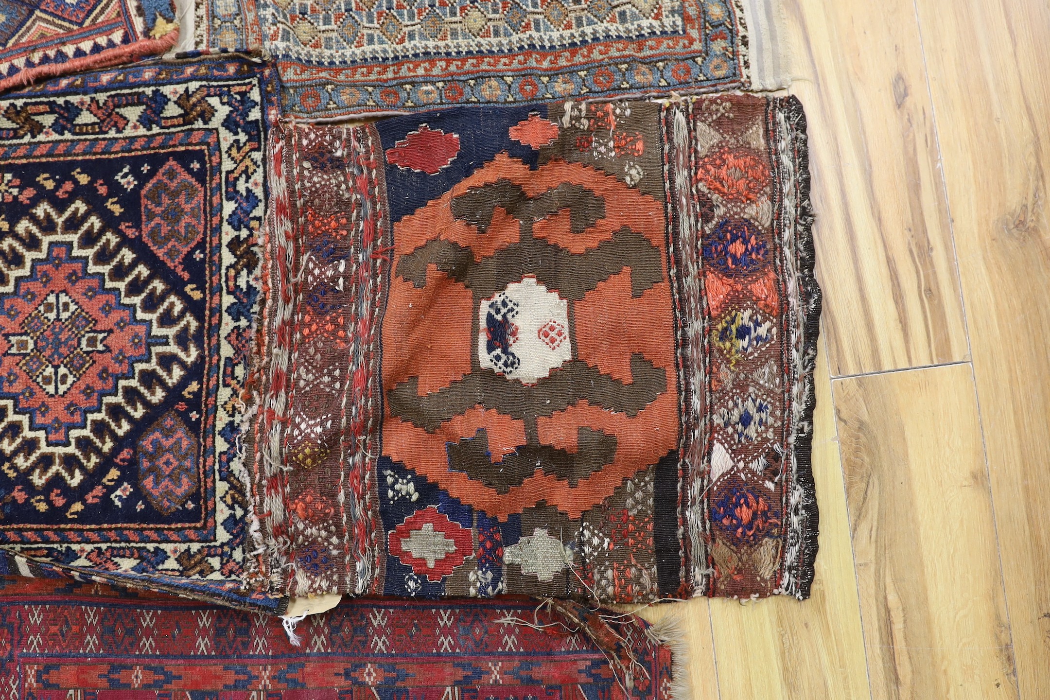 Two carpet saddlebags: Kasquai and a Shamdavan salt bag, a Kilim panel, a Soumac and a Tekke fragment